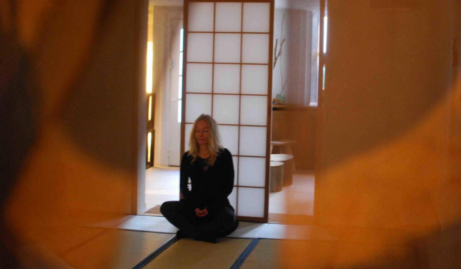 Maria meditating in a quiet space