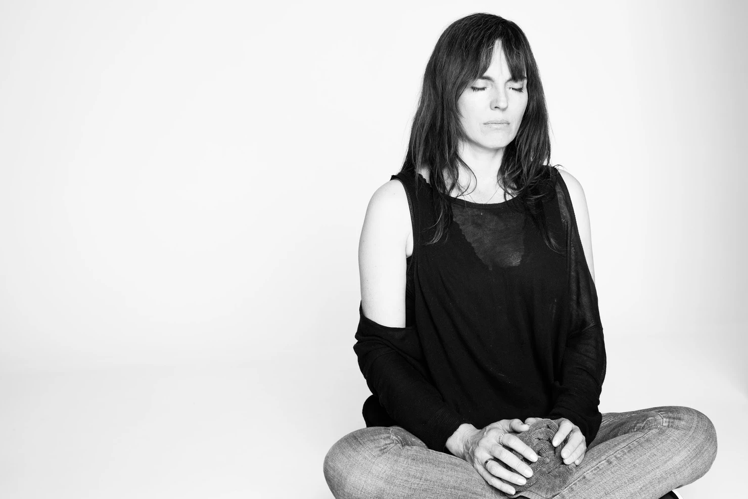 Tristan Gribbin meditating in black and white