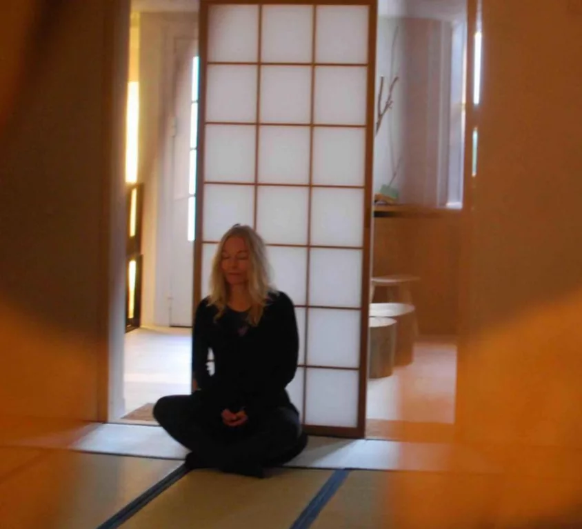 Maria meditating in a quiet space